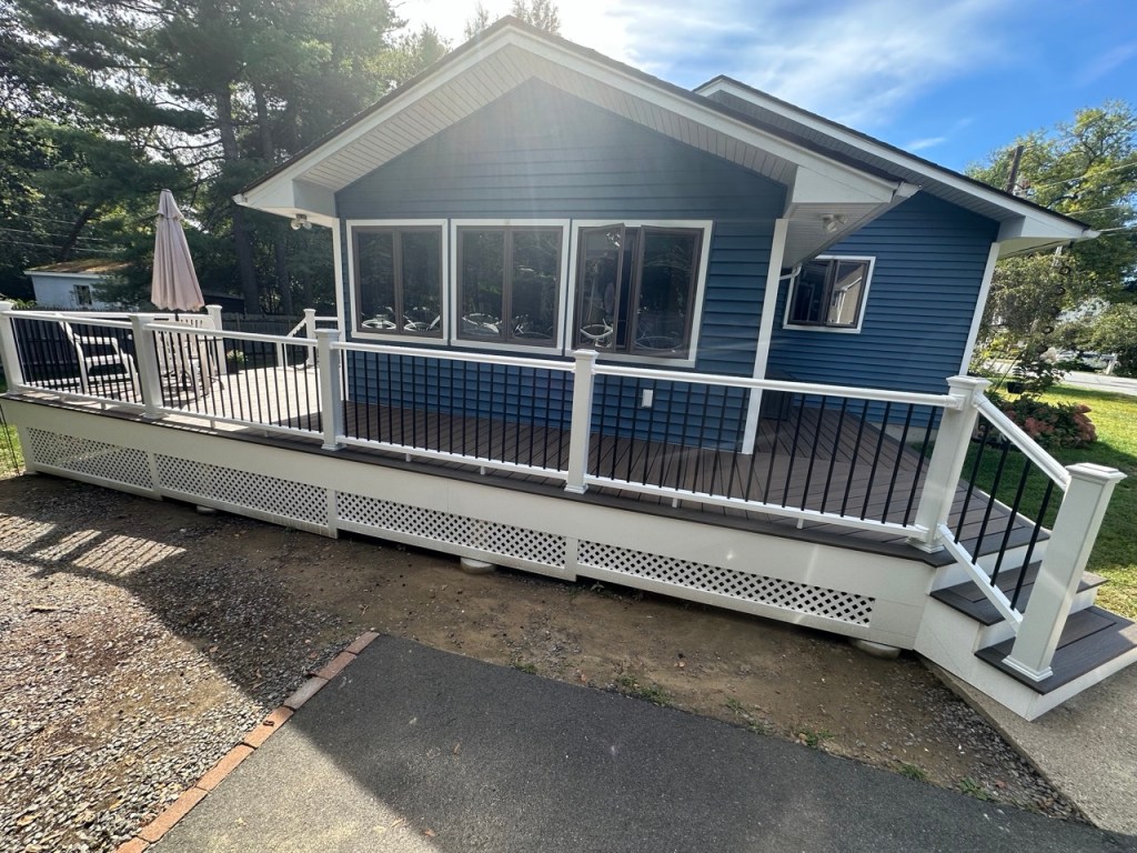 side of deck with blue house - 2