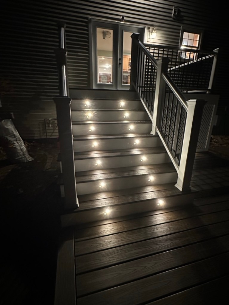 deck stairs going up with lights